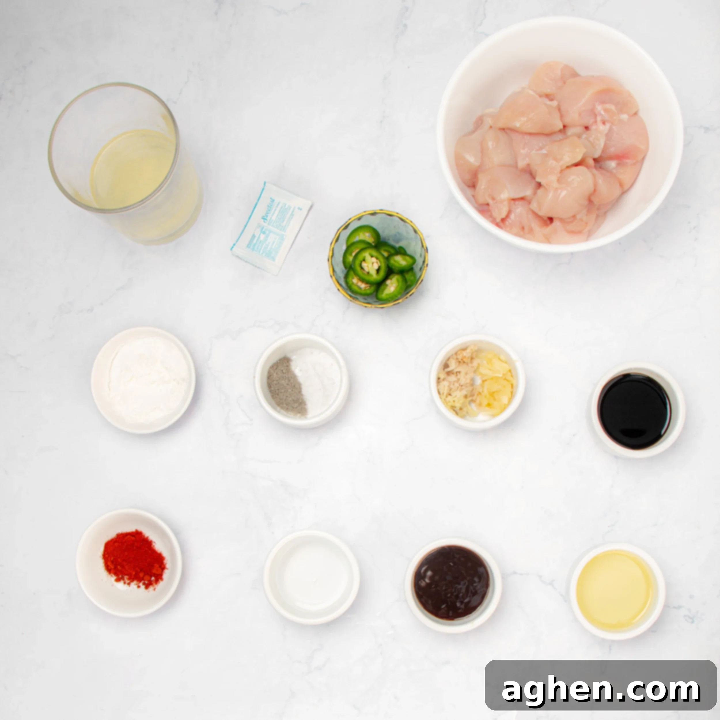 Ingredients for healthy General Tso's chicken in separate dishes on a counter. 