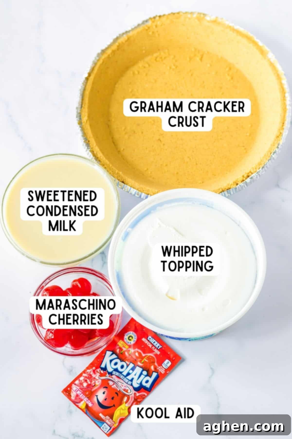 No-Bake Kool-Aid Dream Pie 4 Graham cracker pie crust, sweetened condensed milk, whipped topping, maraschino cherries and packet of kool aid.