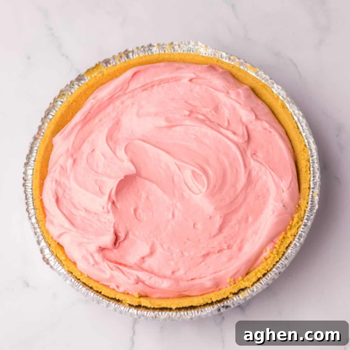 No-Bake Kool-Aid Dream Pie 7 Crust filled with kool aid mixture.