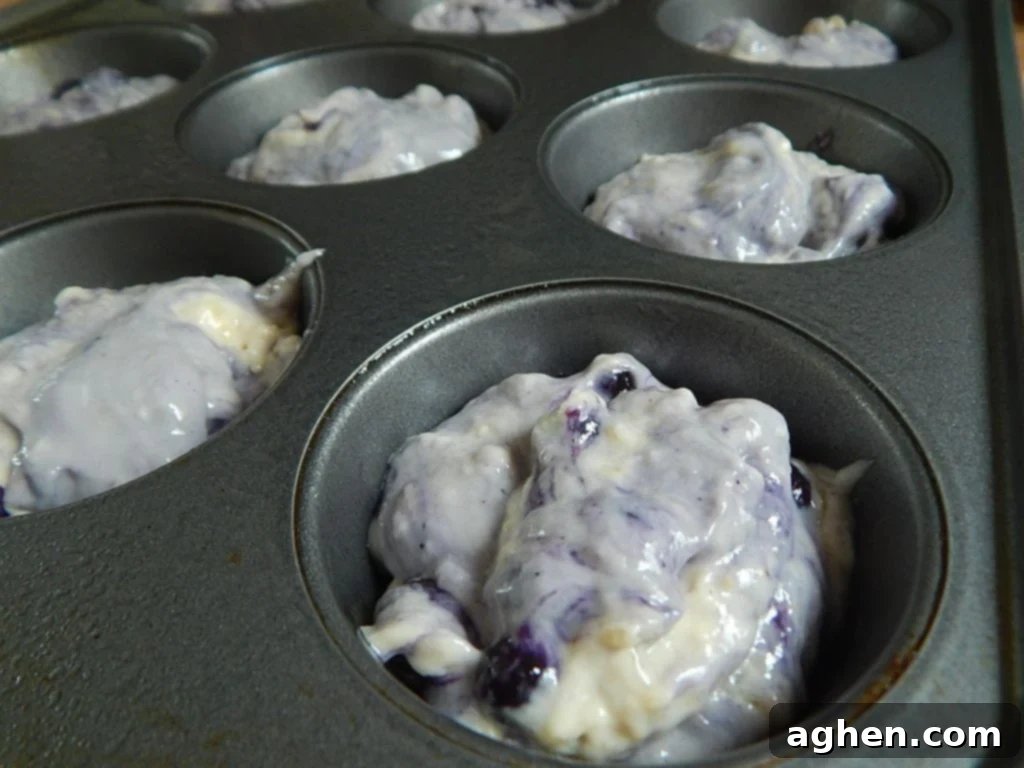Blueberry lemon yogurt muffins drizzled with a simple lemon glaze