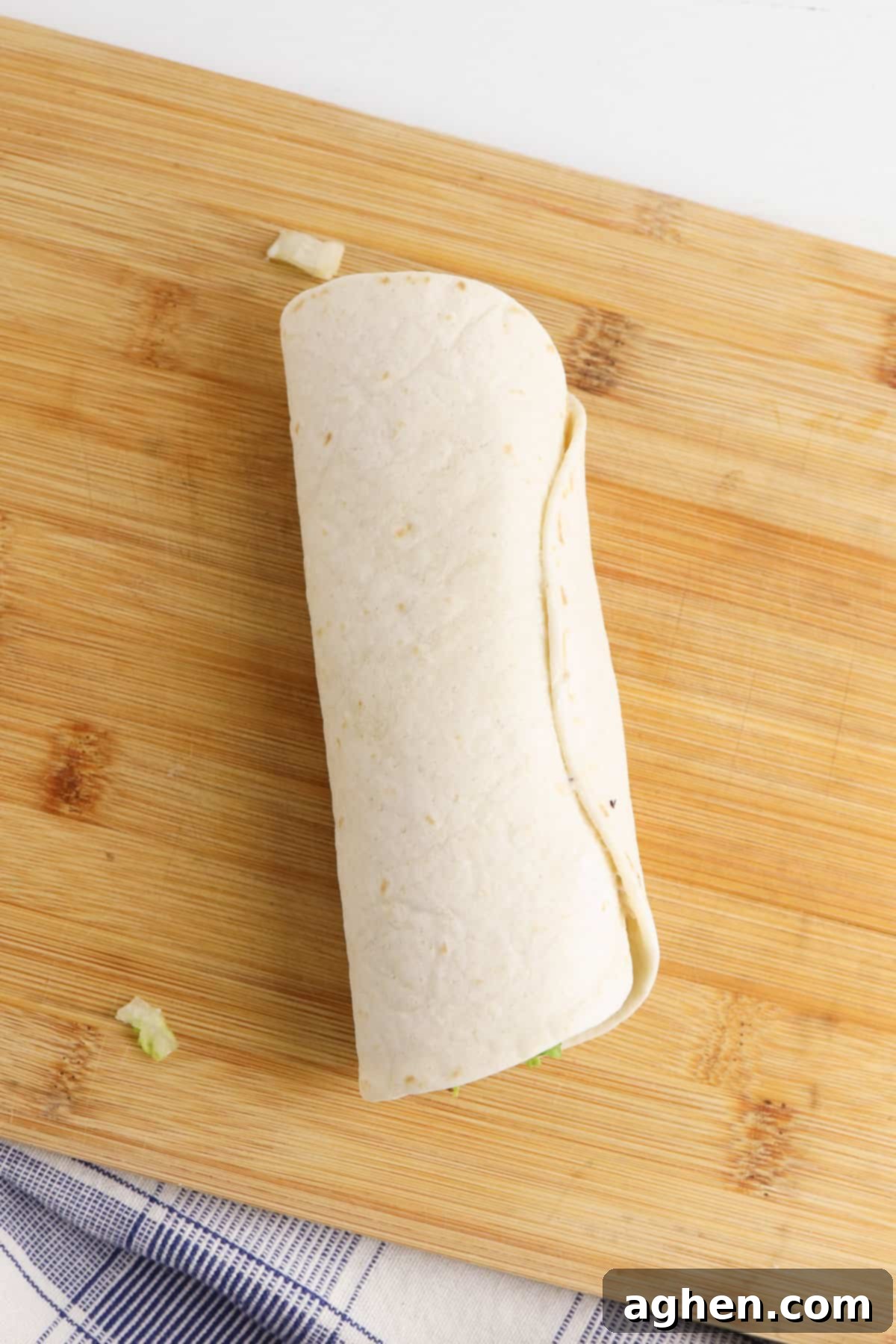 Creamy Ranch BLT Swirls 5 Tortillas wrapped into a log, similar to a burrito, before chilling.