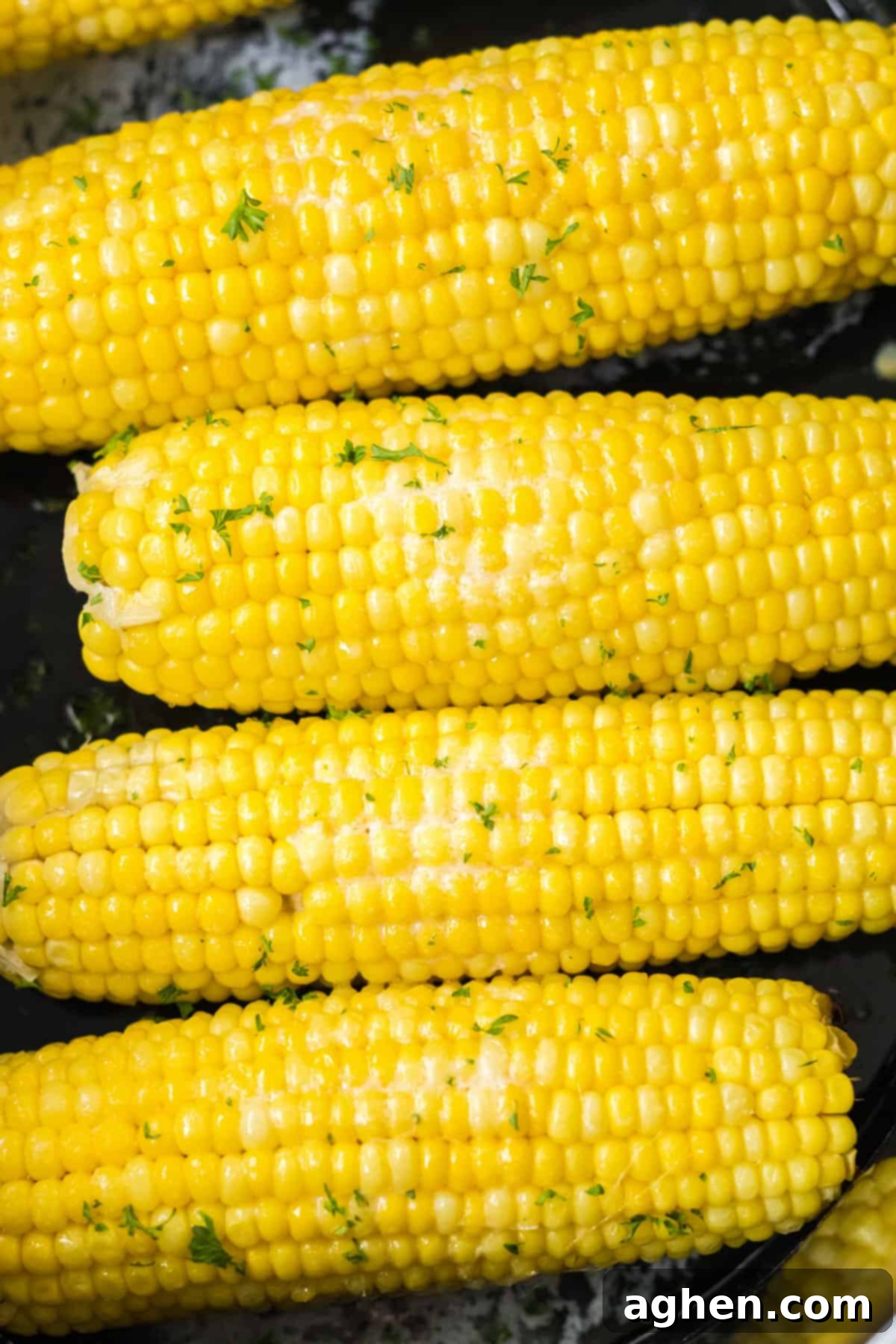 Effortless Slow Cooker Corn 2 Perfectly cooked slow cooker corn on the cob.