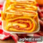 Pepperoni bread with frozen bread dough and mozzarella cheese sliced and on a white plate.