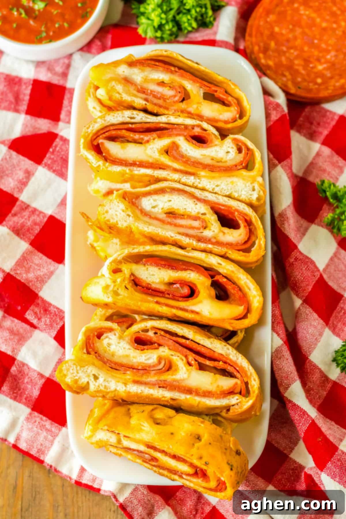 Serving tray with slices of pepperoni bread  made with mozzarella cheese and frozen bread dough.
