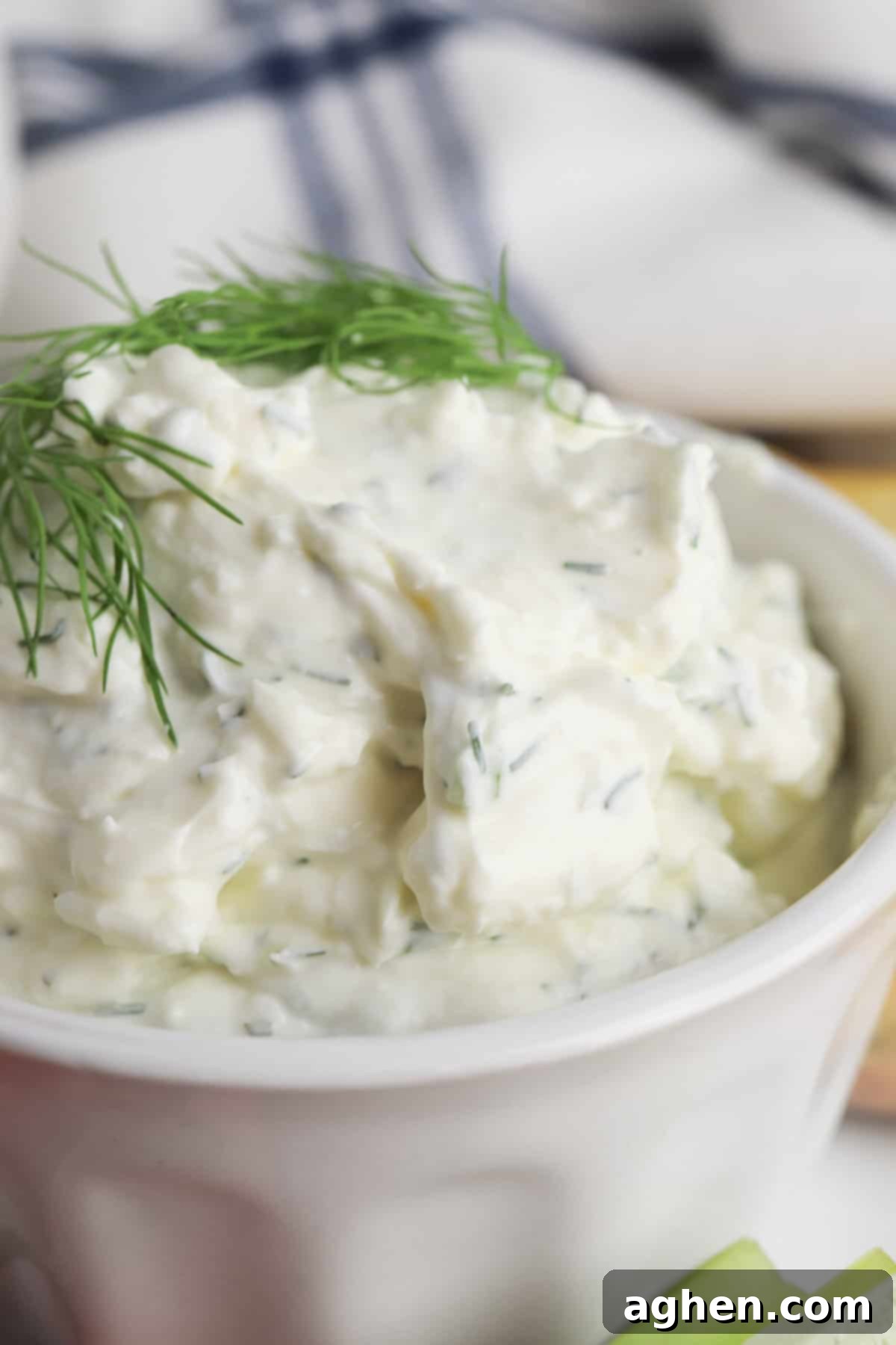 Creamy dill dip made with cream cheese, sour cream, fresh dill, green onions, and seasonings.