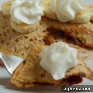 Close-up of a golden-brown Banana S'mores Flatout Pocket, showcasing its crispy exterior and the hint of sweet filling.