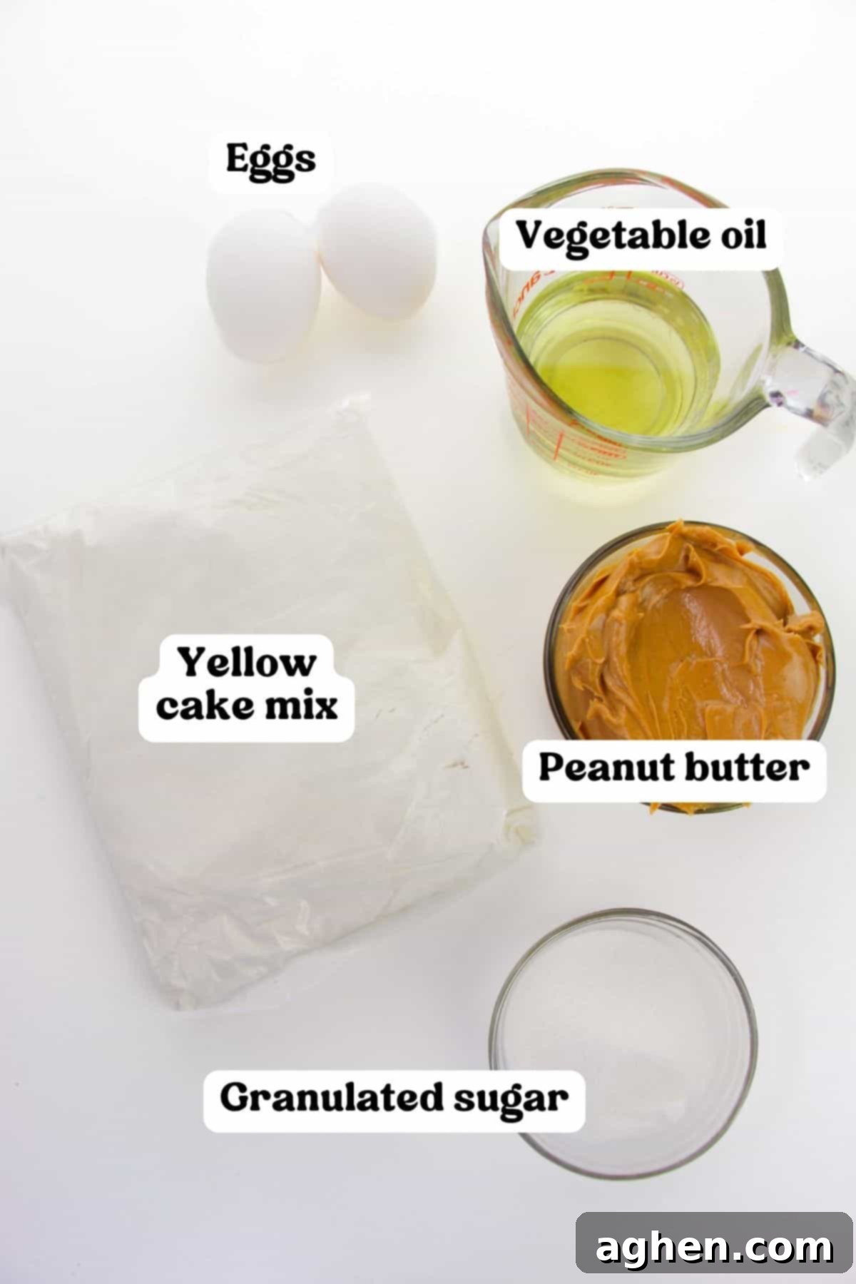 Bag of yellow cake mix, oil, peanut butter, granulated sugar, and 2 eggs.