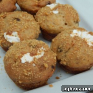 Mini Banana S'mores Muffins 2 Close-up of mini banana s'mores muffin with marshmallow and chocolate