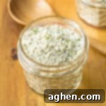 Homemade Ranch Seasoning Mix 8 Homemade ranch seasoning mix with buttermilk powder in a small glass jar.