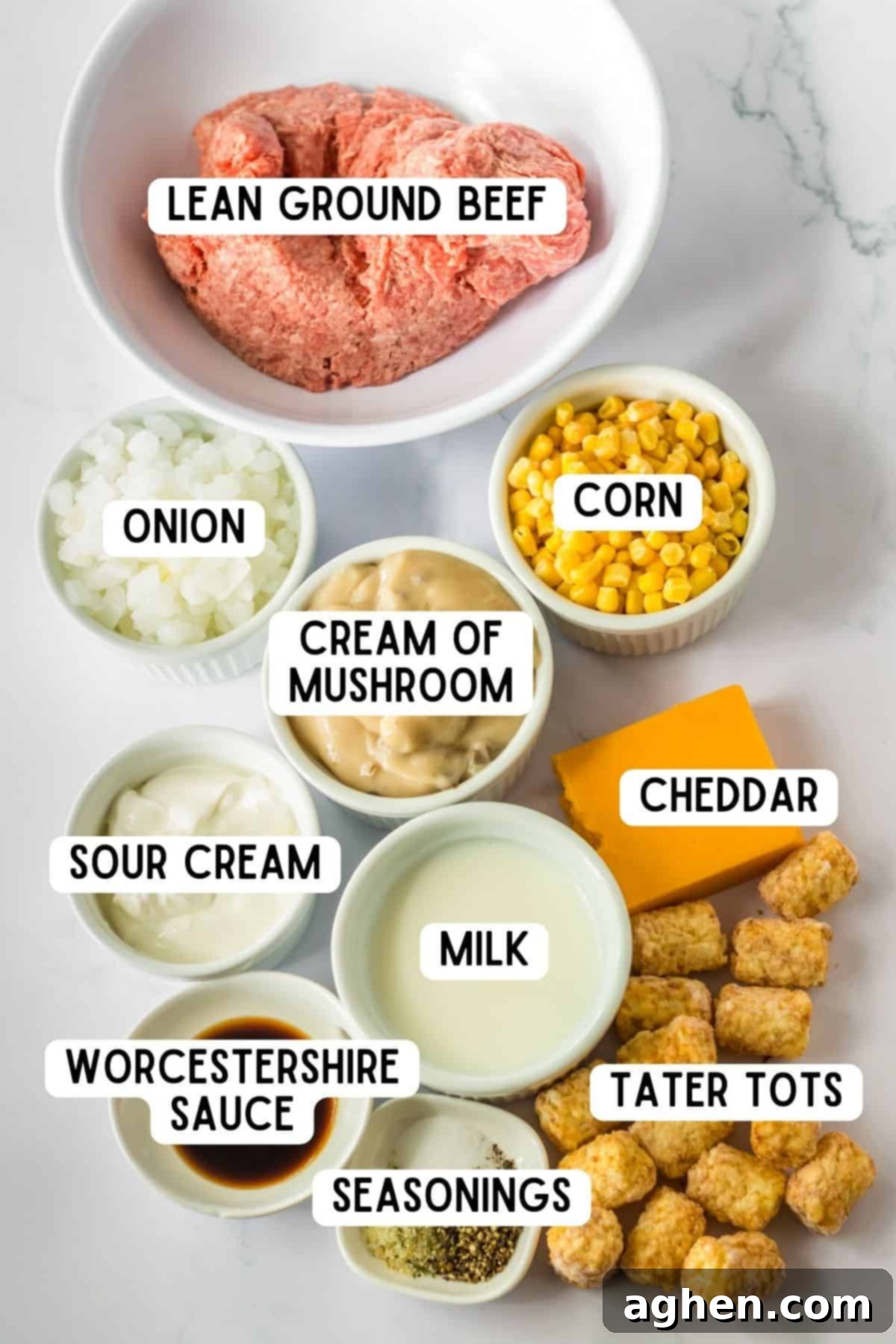 Effortless Tater Tot Comfort 4 Ingredients for crock pot tater tot casserole: lean ground beef, corn, onion, cream of mushroom, cheddar, sour cream, milk, worcestershire sauce, tater tots, and seasonings.