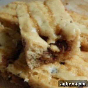 Chewy Caramel Delights 2 Close-up of a stack of three caramel squares with a rich drizzle, ready to be enjoyed