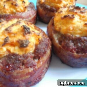 Bacon Wrapped Beef Burgers Stuffed with Buffalo Chicken 2 A top-down view of a ready-to-eat buffalo chicken stuffed bacon-wrapped burger
