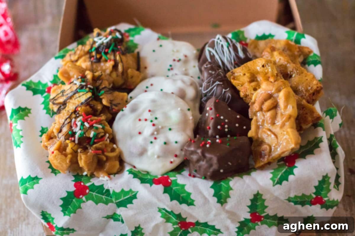 Variety of homemade Christmas candies in gift box lined with holiday tissue paper. A beautifully arranged assortment of homemade festive candies, ready for gifting.