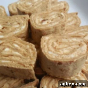 pumpkin spice rollups on a white plate