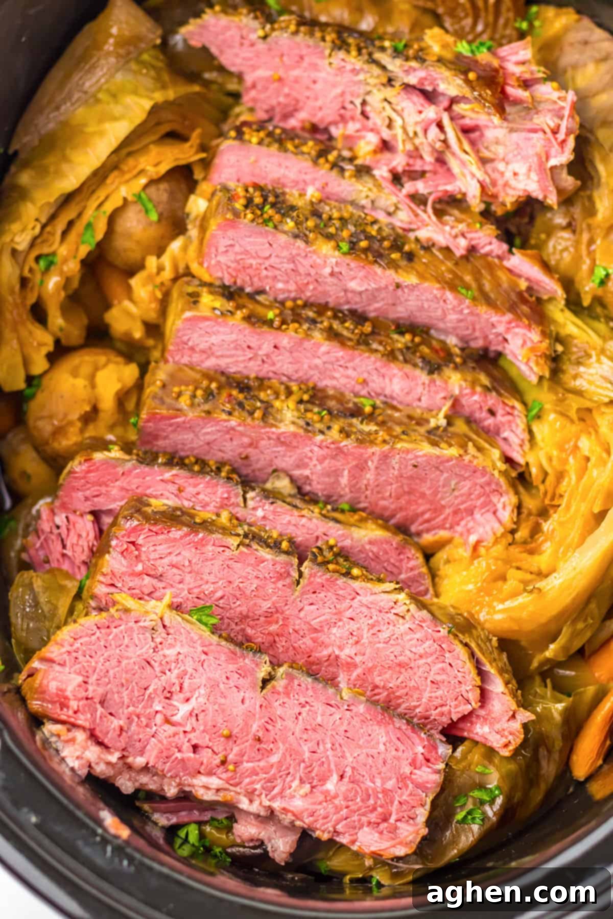 Crockpot corned beef brisket and cabbage in the bowl of a slow cooker.