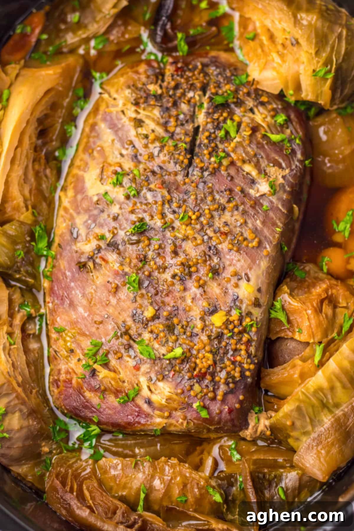Whole corned beef and cabbage meal in crockpot.