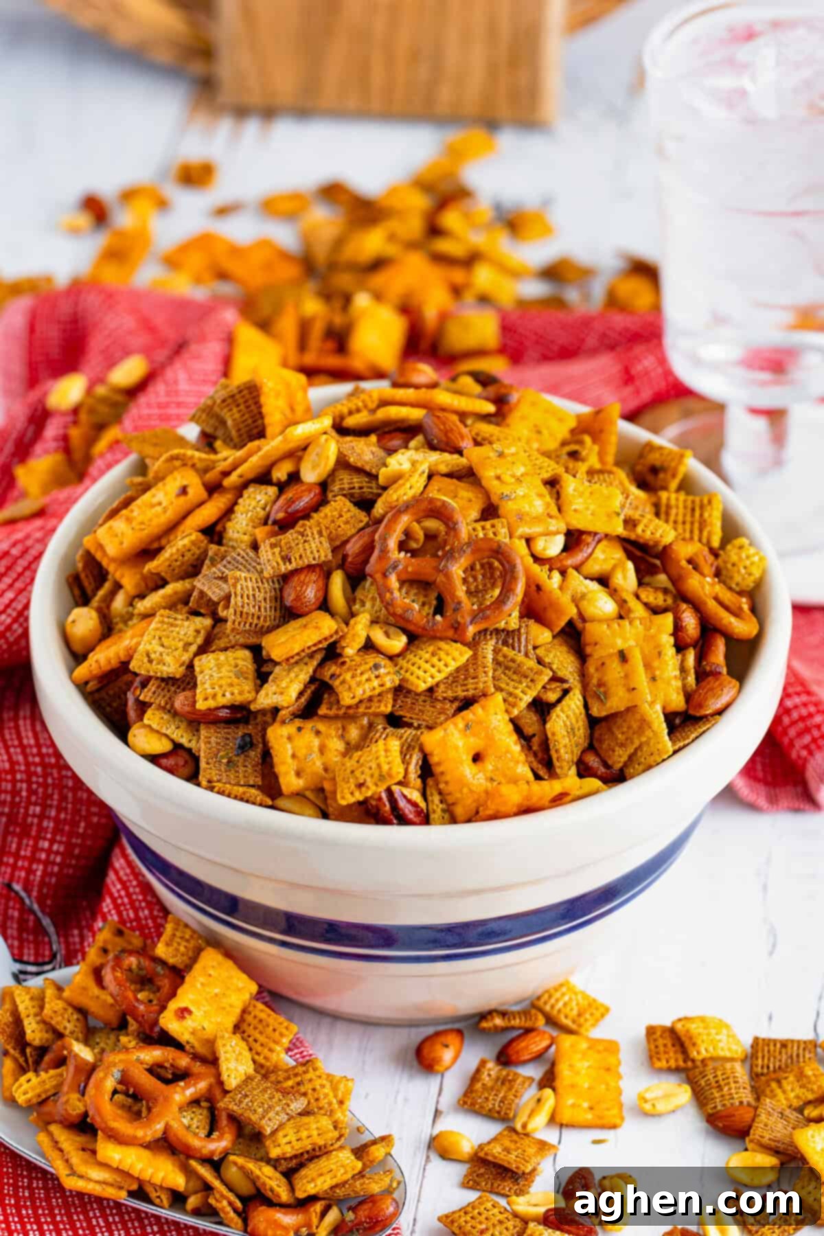 Zesty Crunch Medley 2 Firecracker spicy chex mix with pretzels, crackers, nuts, coated in a spicy ranch seasoning mix.