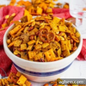 Zesty Crunch Medley 11 Firecracker spicy chex mix with pretzels, crackers, nuts, coated in a spicy ranch seasoning mix.
