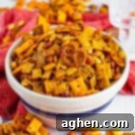 Zesty Crunch Medley 12 Firecracker spicy chex mix with pretzels, crackers, nuts, coated in a spicy ranch seasoning mix.