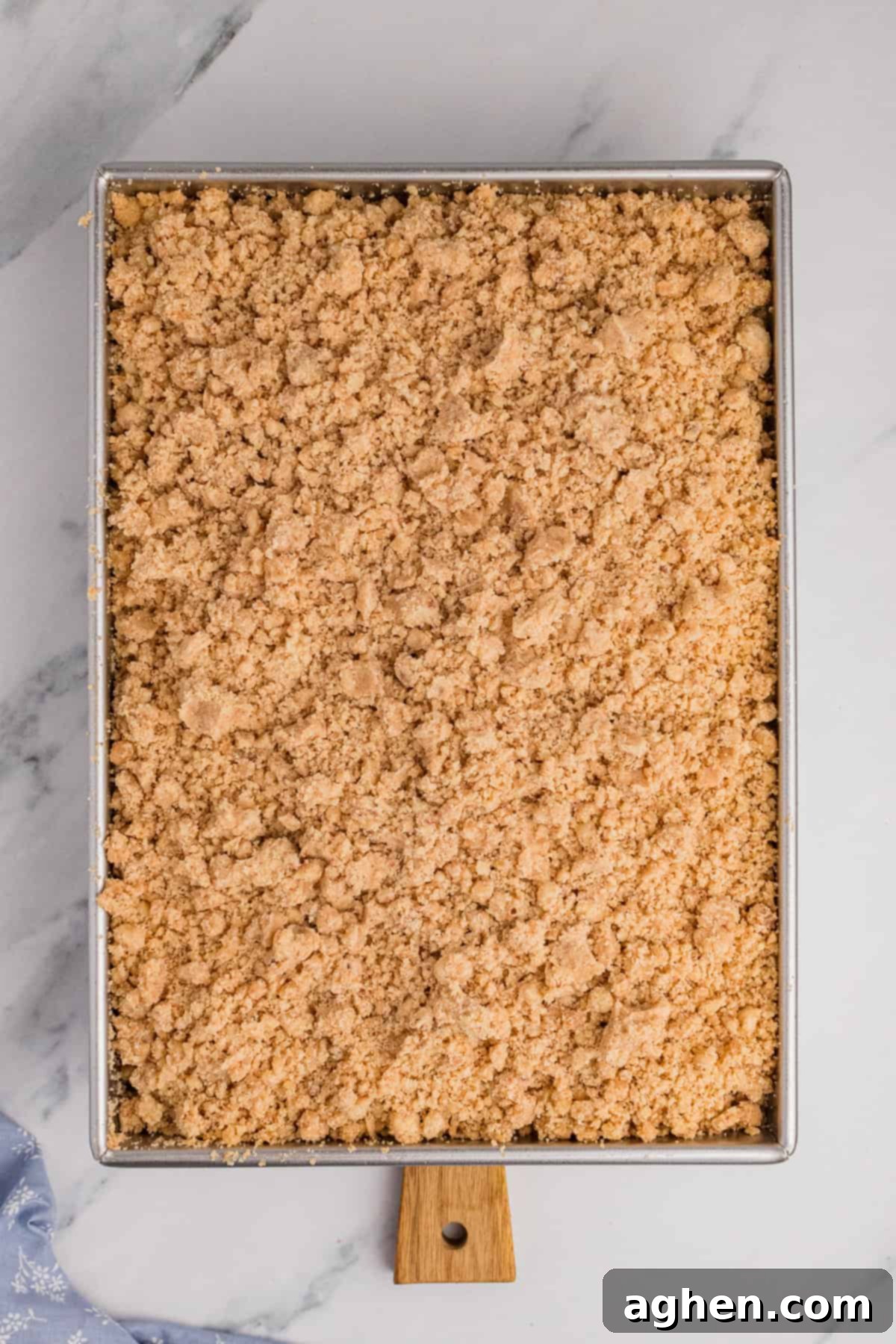 Simple Crumb Cake Perfection 7 Overhead photo of 9 x 13 inch crumb cake in metal baking pan.