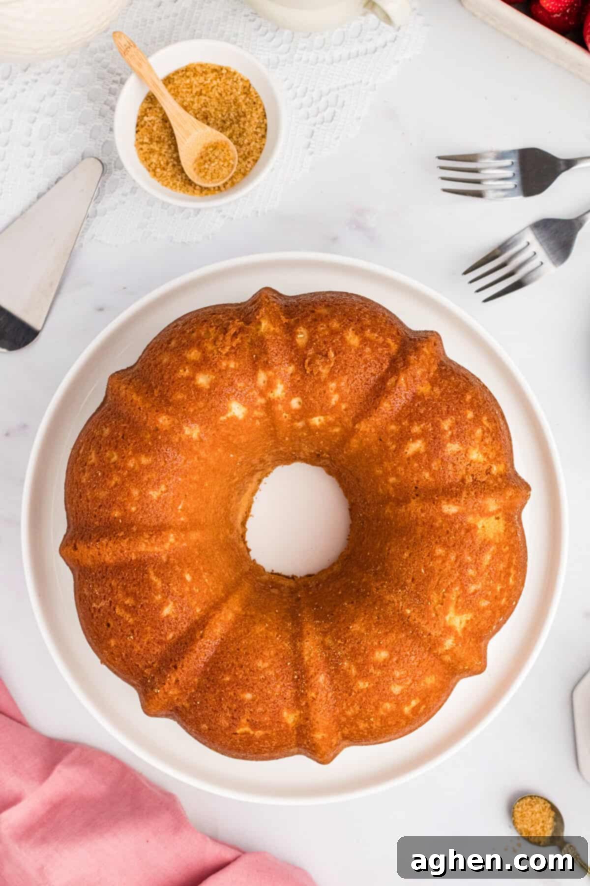 Sour cream pound cake on serving platter.