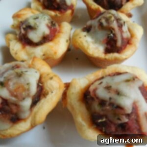 Cheesy Meatball Pizza Cups 2 Close-up of a single pizza meatball mini cup