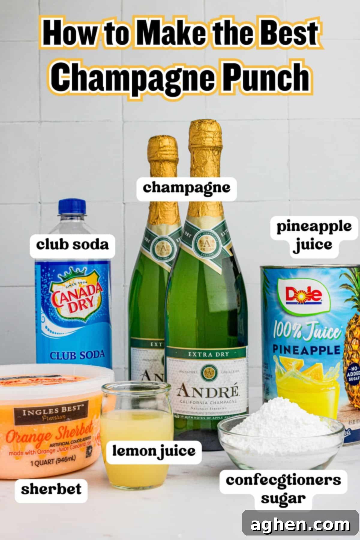 Two bottles of champagne, quart of orange sherbet, can of pineapple juice, bottle of club soda, confectioners sugar in bowl, and small glass of fresh lemon juice.