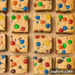 Chocolate chip and M&M cookie bars, a perfect blend of sweetness and texture.