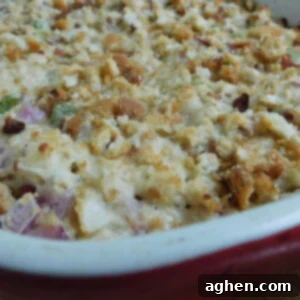 Chicken Caesar Bubble-Up Bake 2 Chicken Caesar Bubble Up Casserole in a square dish, with a slice removed