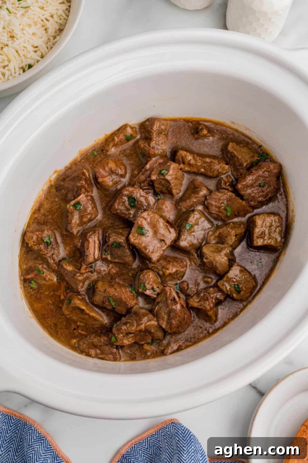 Crockpot filled with saucy bourbon steak tips.