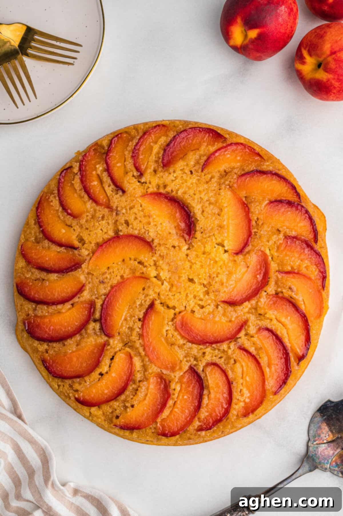Foolproof Peach Upside Down Delight 2 Overhead view of round peach upside-down cake with cake mix.