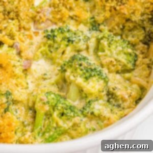 Cheesy Broccoli Delight 12 Broccoli casserole topped with golden panko breadcrumbs in a white baking dish.