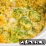 Cheesy Broccoli Delight 13 Broccoli casserole topped with golden panko breadcrumbs in a white baking dish.