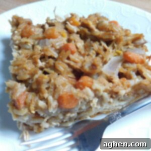 Close-up of the golden-brown biscuit topping and savory filling of the Chicken Fried Rice Bubble Up Casserole.
