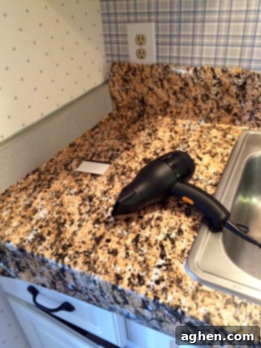 Blow dryer on countertop.