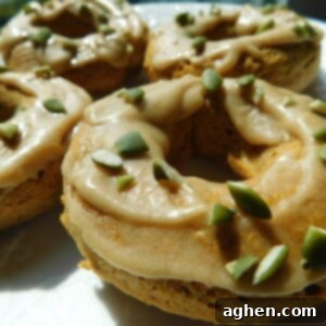 Ultimate Pumpkin Spice Donuts with Brown Sugar Buttercream Bliss 2 Pumpkin Spice Donuts on white plate