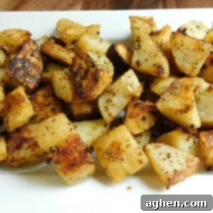 Parmesan Potatoes on White Plate
