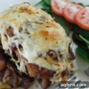 Savory French Onion Chicken 2 French Onion Chicken on white plate