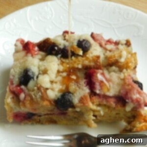 Berry Burst French Toast 2 Healthy Berry French Toast Bake with fresh berries on top.