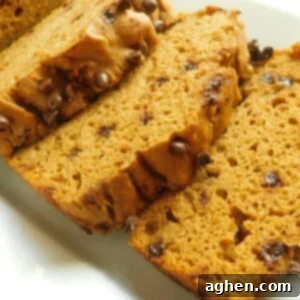 A perfectly baked loaf of Weight Watchers Chocolate Pumpkin Bread, rich in color and texture.