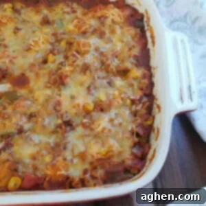 Cheesy Chicken Chili Bake 2 chicken chili bubble up in white casserole dish