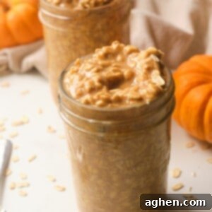 Pumpkin Spice Latte Overnight Oats 2 Weight Watchers friendly Pumpkin Latte Overnight Oats in a mason jar, topped with a spoon.