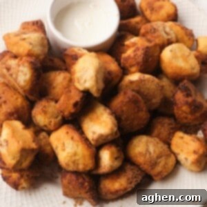 Mini Air Fryer Cinnamon Rolls 2 Weight watchers Air Fryer Cinnamon Roll Bites on white plate