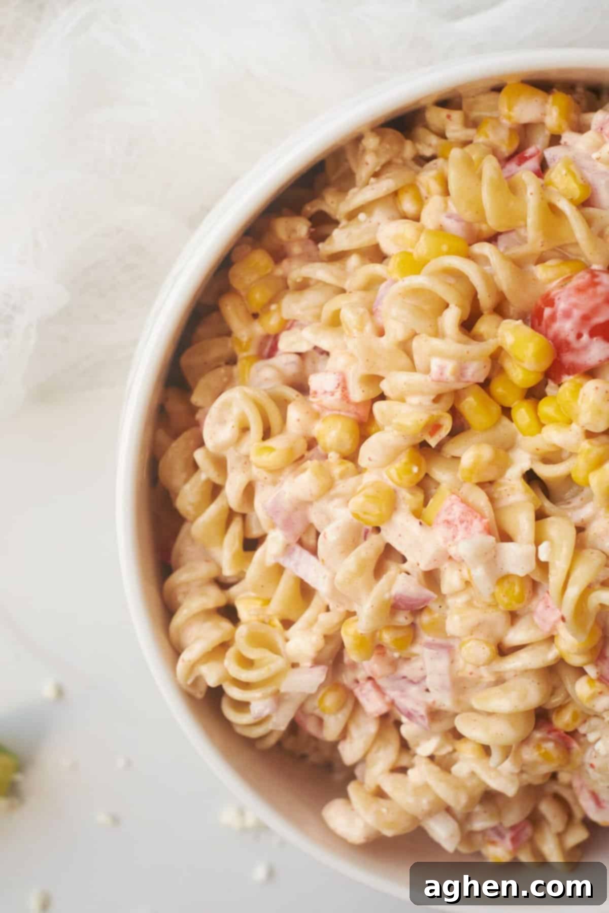 31 Delicious Healthy Sides for Any Meal 5 Zesty Corn Pasta Salad in white bowl