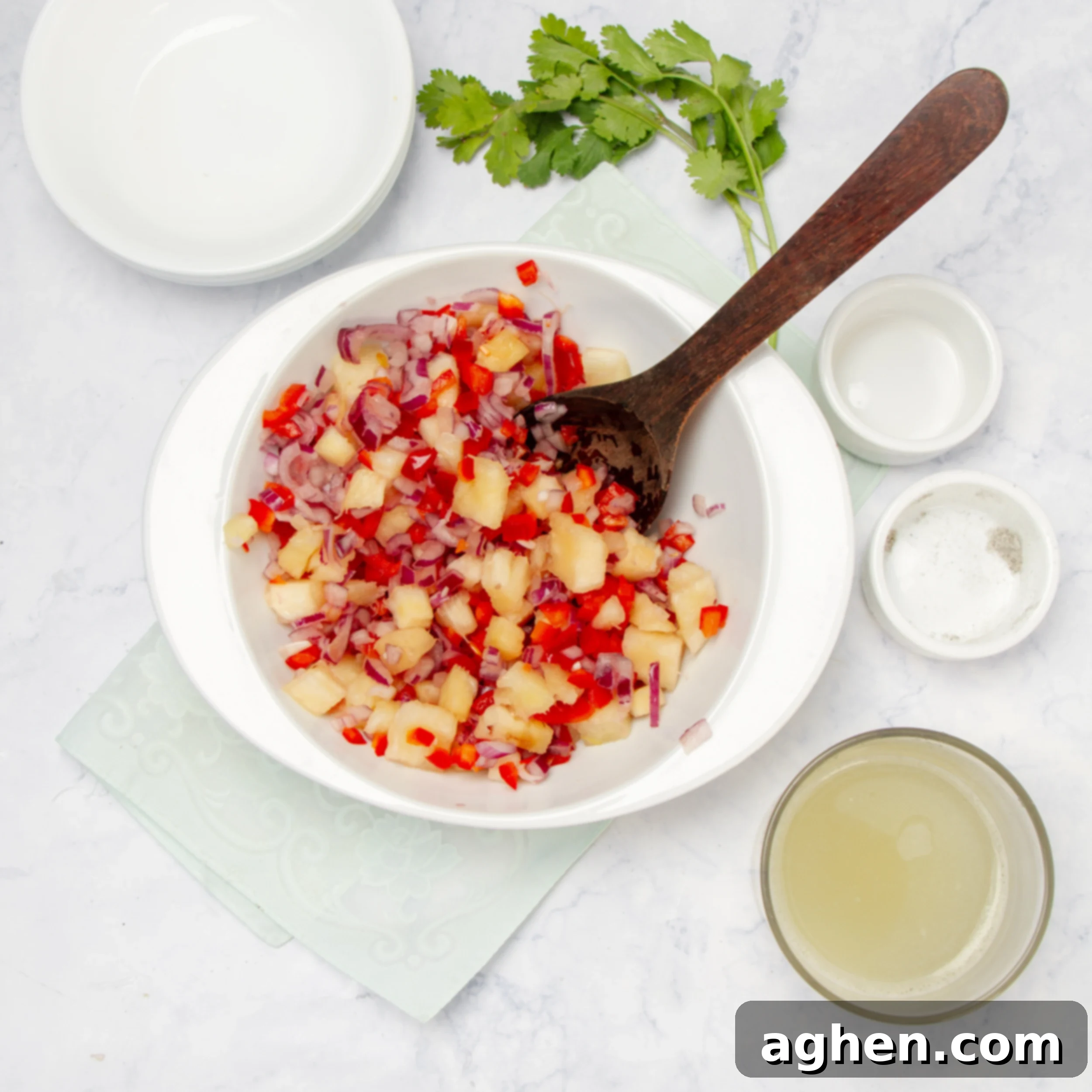 Pineapple Salsa Pork Tenderloin Feast 5 Pineapple salsa ingredients mixed in a small bowl.