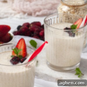 Velvet Overnight Oats 2 overnight oats in glass jar topped with strawberries