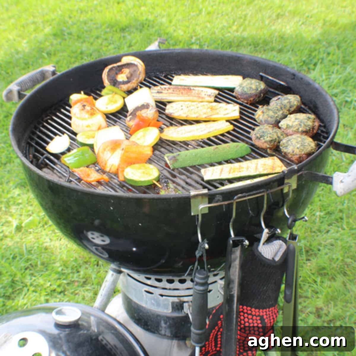 Celebrity Grill Secrets: 6 Weber Tips from Top Chefs and Pitmasters 1 weber charcoal grill cooking meat and veggies