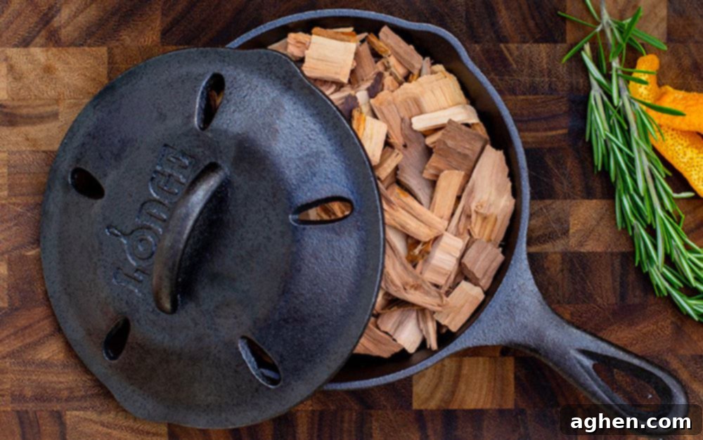 Celebrity Grill Secrets: 6 Weber Tips from Top Chefs and Pitmasters 3 various meats smoking on a weber grill