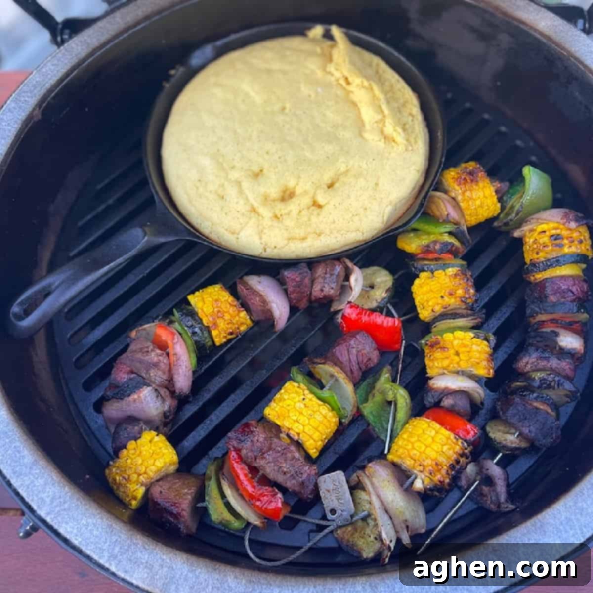 12 Steps to Mastering Your Big Green Egg's Ultimate Accessory 2 steak kabobs cooking on a big green egg