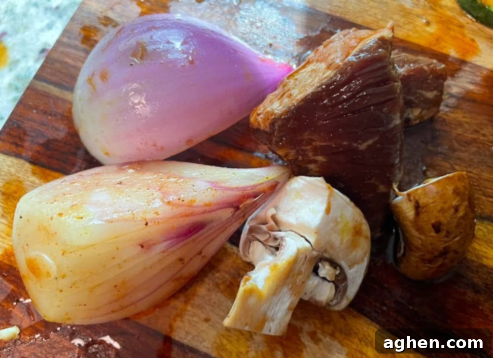 12 Steps to Mastering Your Big Green Egg's Ultimate Accessory 6 sliced ingredients on a cutting board